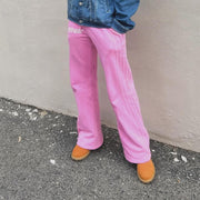 Fashionable personality contrast color fake two-piece trousers