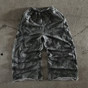 Vintage distressed print casual trousers