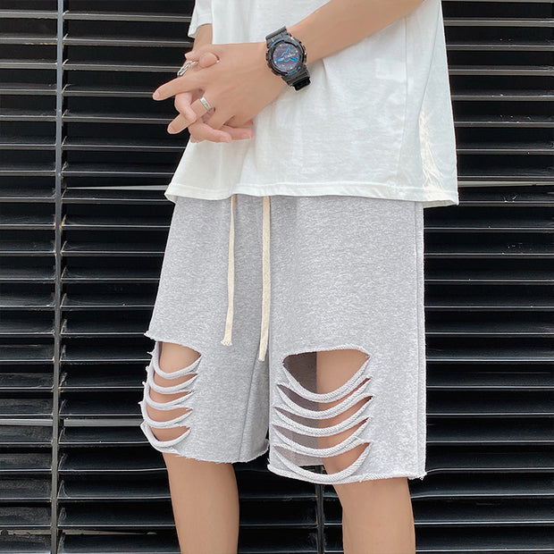 Street trend personality ripped shorts and sweatpants