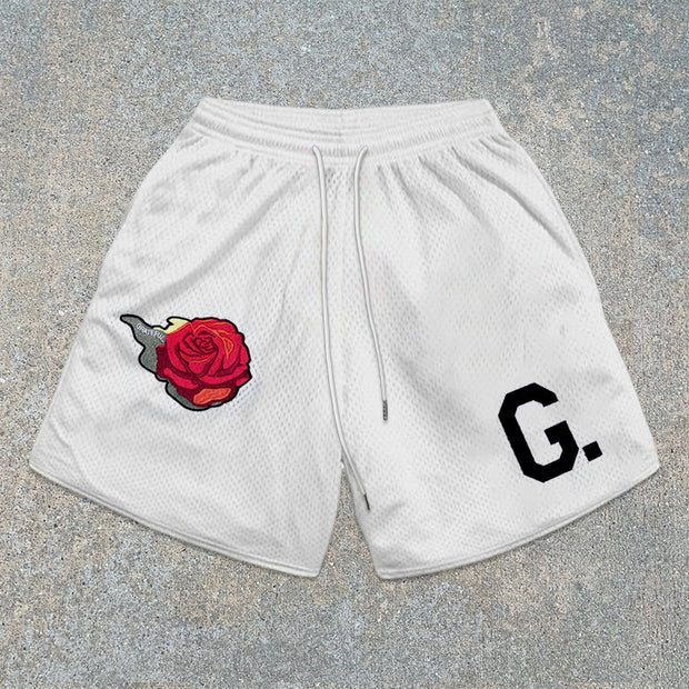 monogram mesh track shorts