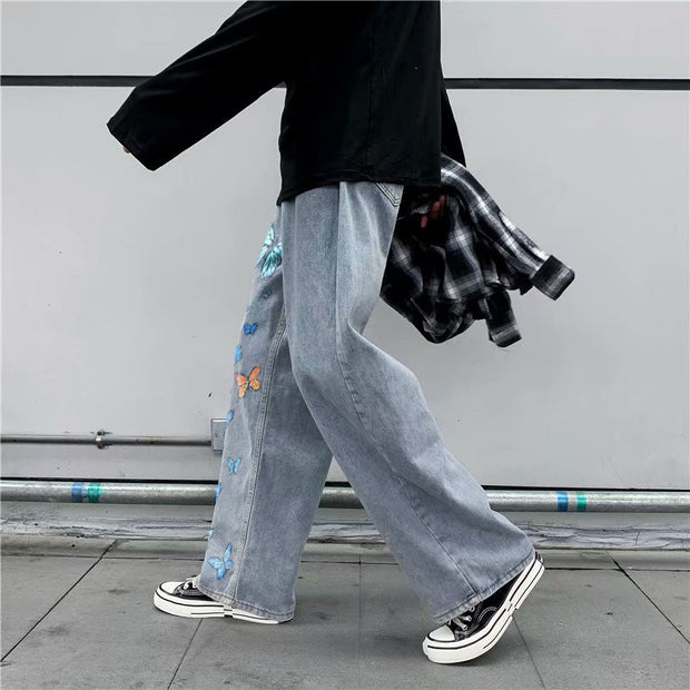 Butterfly print street denim trousers