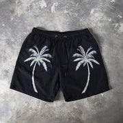Coconut palm print Hawaiian swim shorts