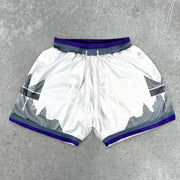 statement-print varsity track shorts