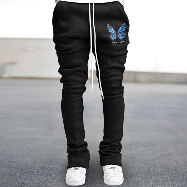 Slim fit flared trousers with vintage butterfly print