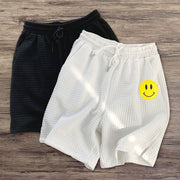 Smiley print waffle shorts