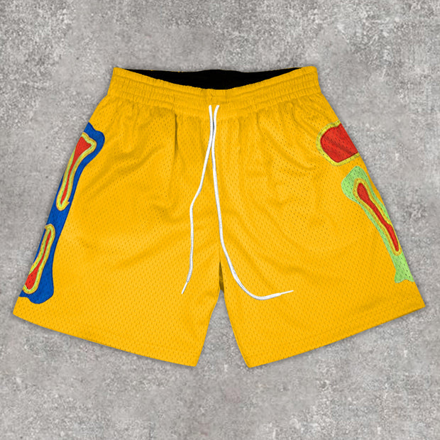Statement bone print track shorts