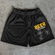 beer print statement mesh shorts