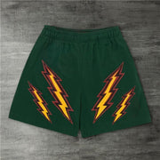 Street style track shorts with double lightning print