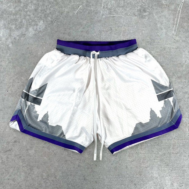 statement-print varsity track shorts