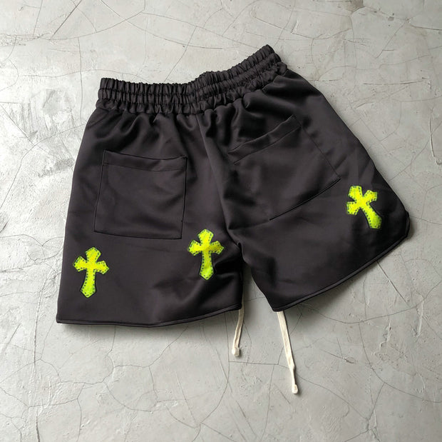 Fluorescent cross-print street track shorts